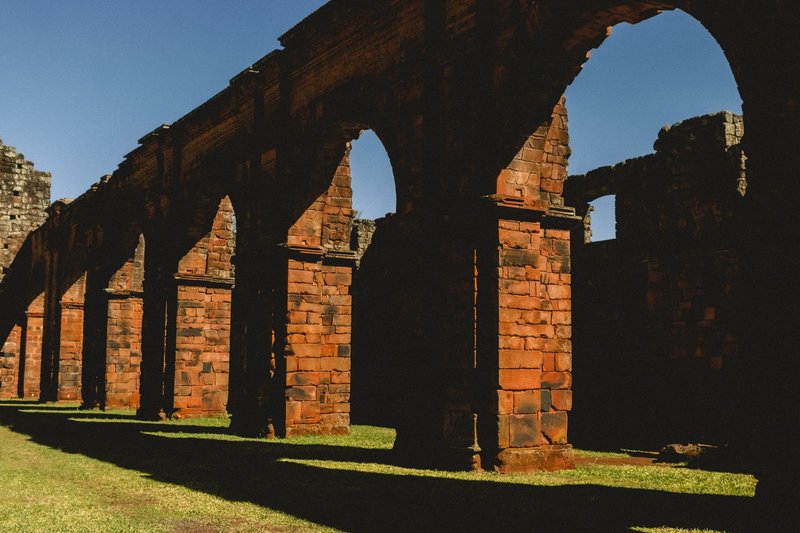 Explore the ancient ruins of São Miguel das Missões, highlighting historic arches and stone structures.
