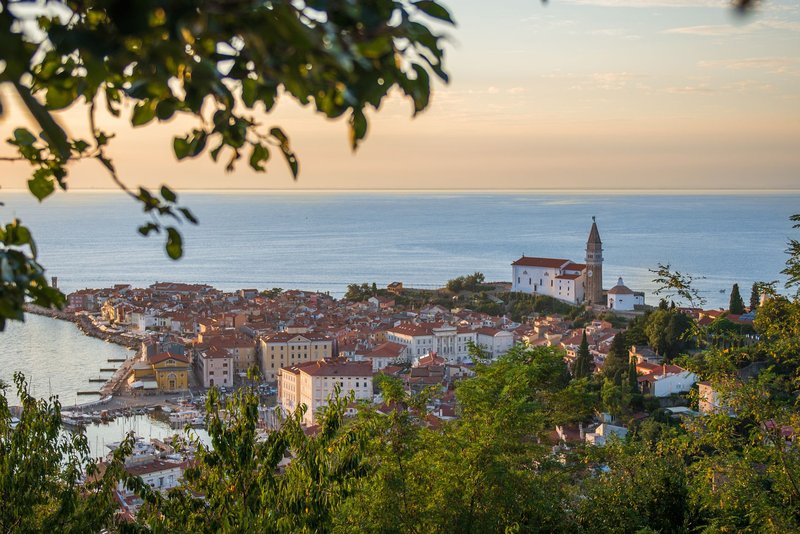Beautiful aerial view of Piran, Slovenia, at sunset with a stunning coastal landscape.