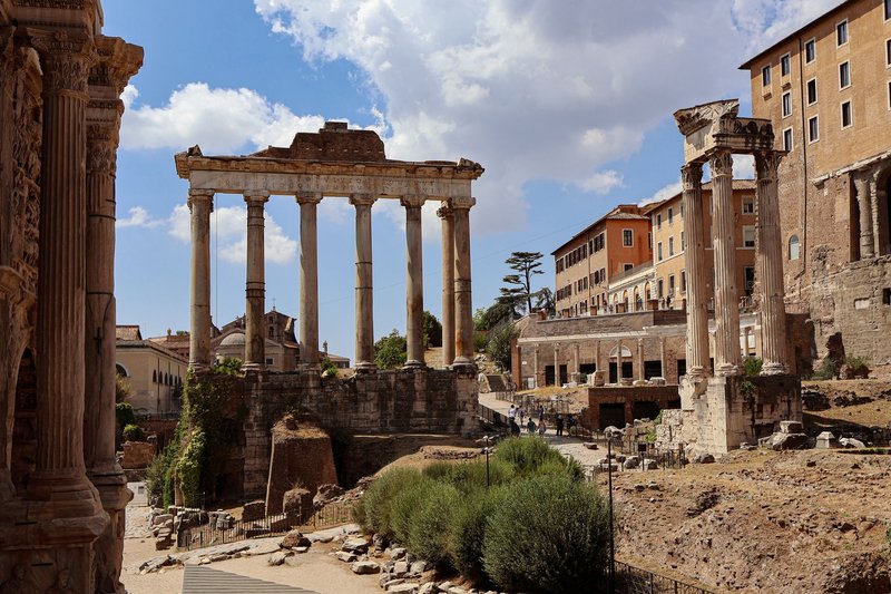 Ancient Roman ruins at the Roman Forum in Rome, showcasing historic architecture and rich history.