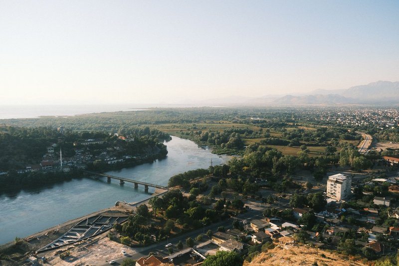 A beautiful aerial view capturing the serene landscape and river in Shkodra, Albania.