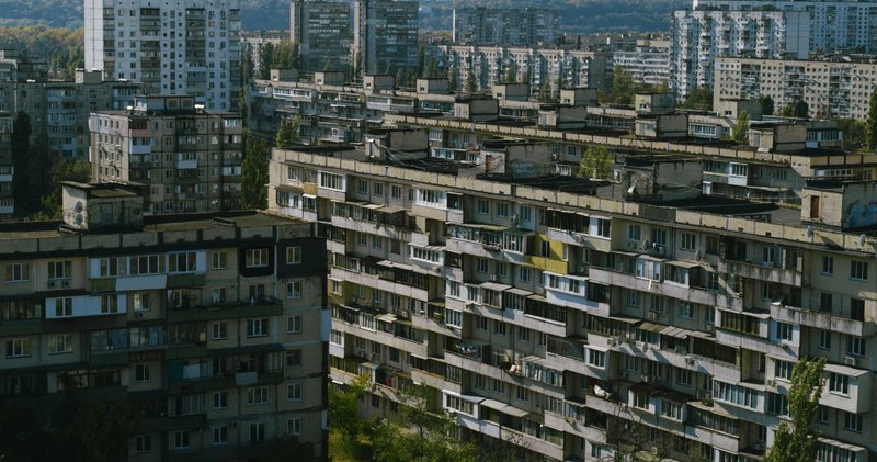 Aerial view of residential buildings in Kyiv showcasing Soviet-era architecture.