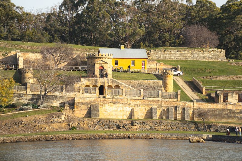 Explore the historic Port Arthur Penal Colony, showcasing stunning architecture and lush surroundings in Tasmania, Australia.
