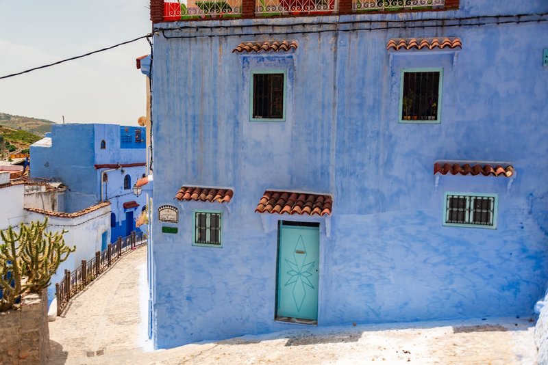 Explore the vibrant blue architecture of Chefchaouen, Morocco, a stunning travel destination.