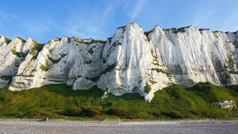 Stunning view of the iconic White Cliffs of Dover on a sunny day.