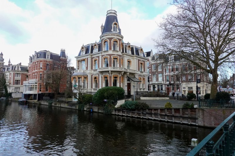 Beautiful 19th-century buildings along a canal in Amsterdam, Netherlands.