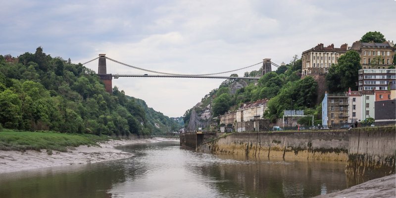 Scenic view of the iconic Clifton Suspension Bridge spanning the Avon Gorge in Bristol, England.