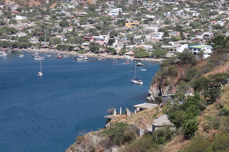 Aerial view of Santa Marta, Colombia, showcasing boats and coastal landscape.