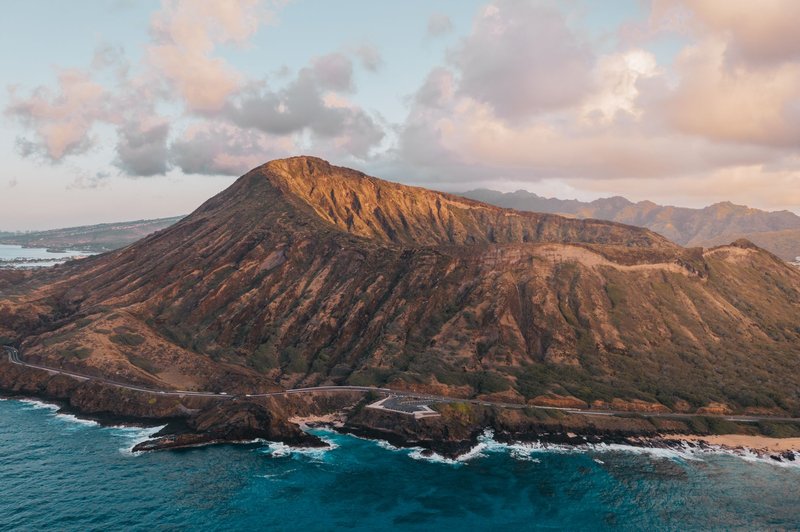 Epic aerial view of Koko Head in Hawaii, highlighting its volcanic landscape and scenic ocean backdrop.
