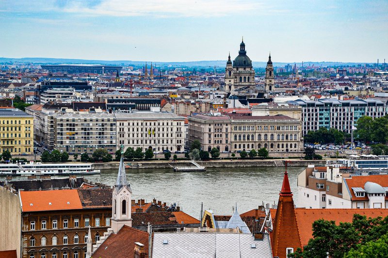 Stunning view of Budapest cityscape featuring historic architecture along the Danube River.