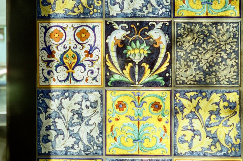 Vibrant, detailed ceramic tiles showcasing intricate floral patterns and vivid colors.