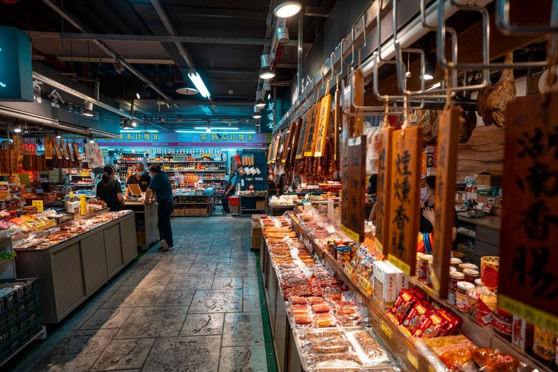 Captivating view of an Asian grocery store interior with diverse food selections.