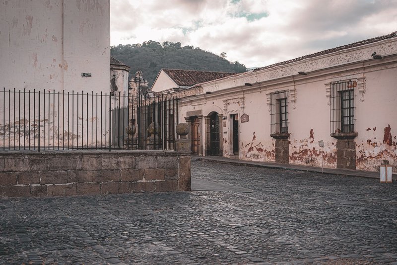 Historic colonial buildings and cobblestone streets in Antigua Guatemala.