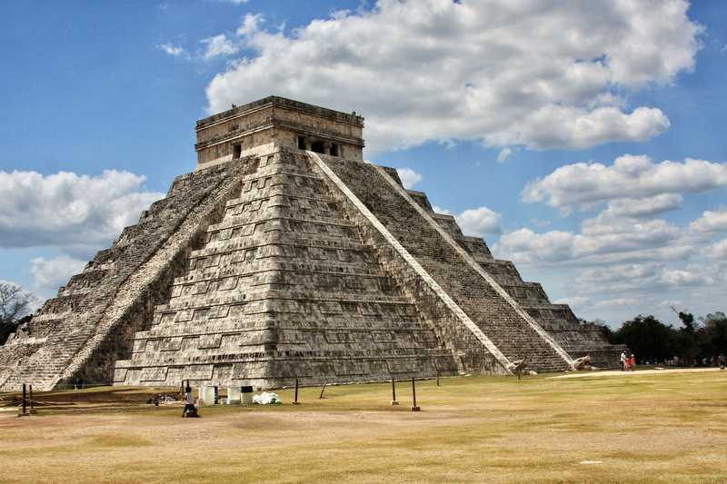Explore the majestic Temple of Kukulcán in sunny Chichén Itzá, Mexico.
